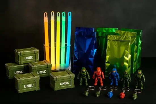 Halo-inspired favor table with mini crates, glow sticks and metallic bags