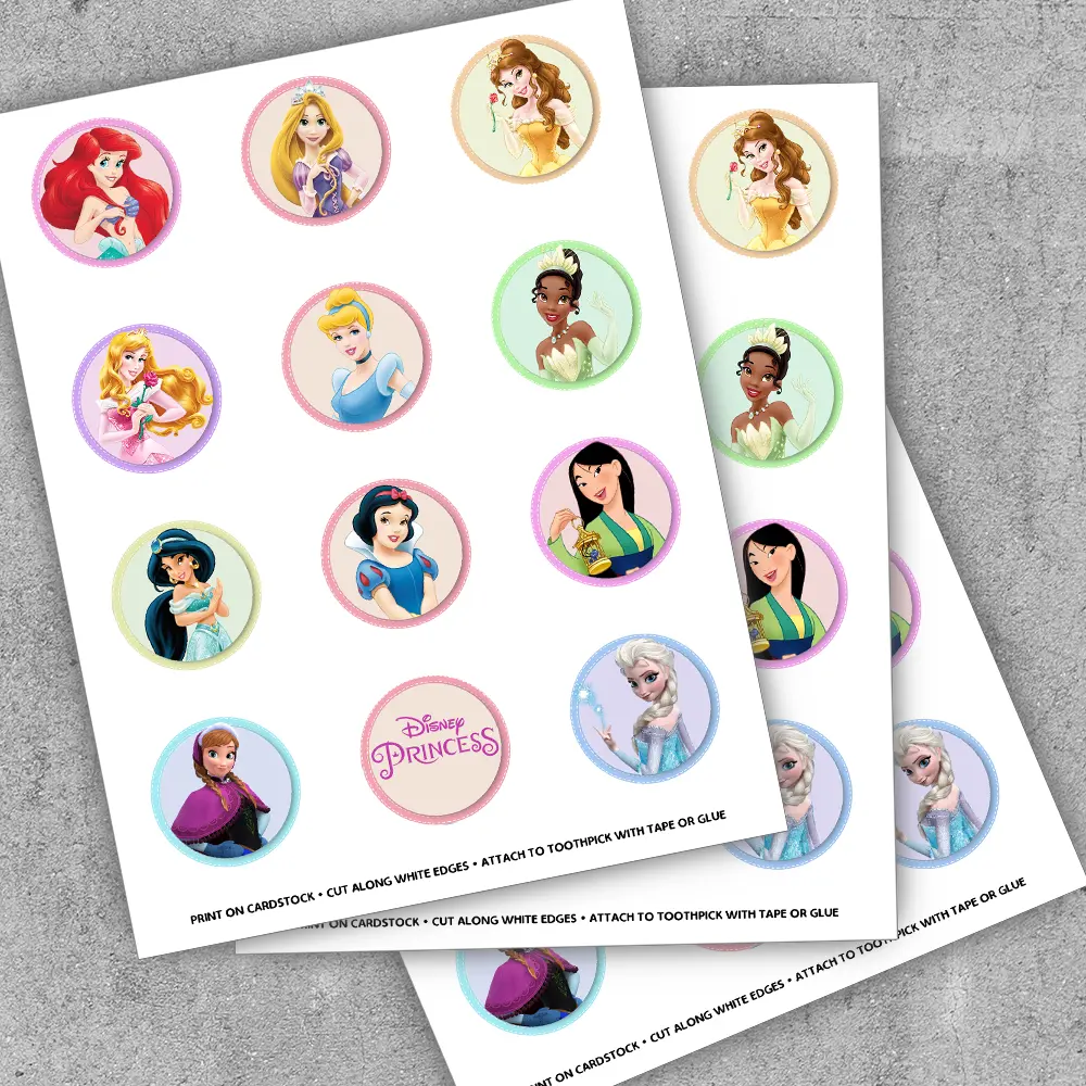 Close-up of 2-inch princess toppers with wands, glass slippers and sparkles