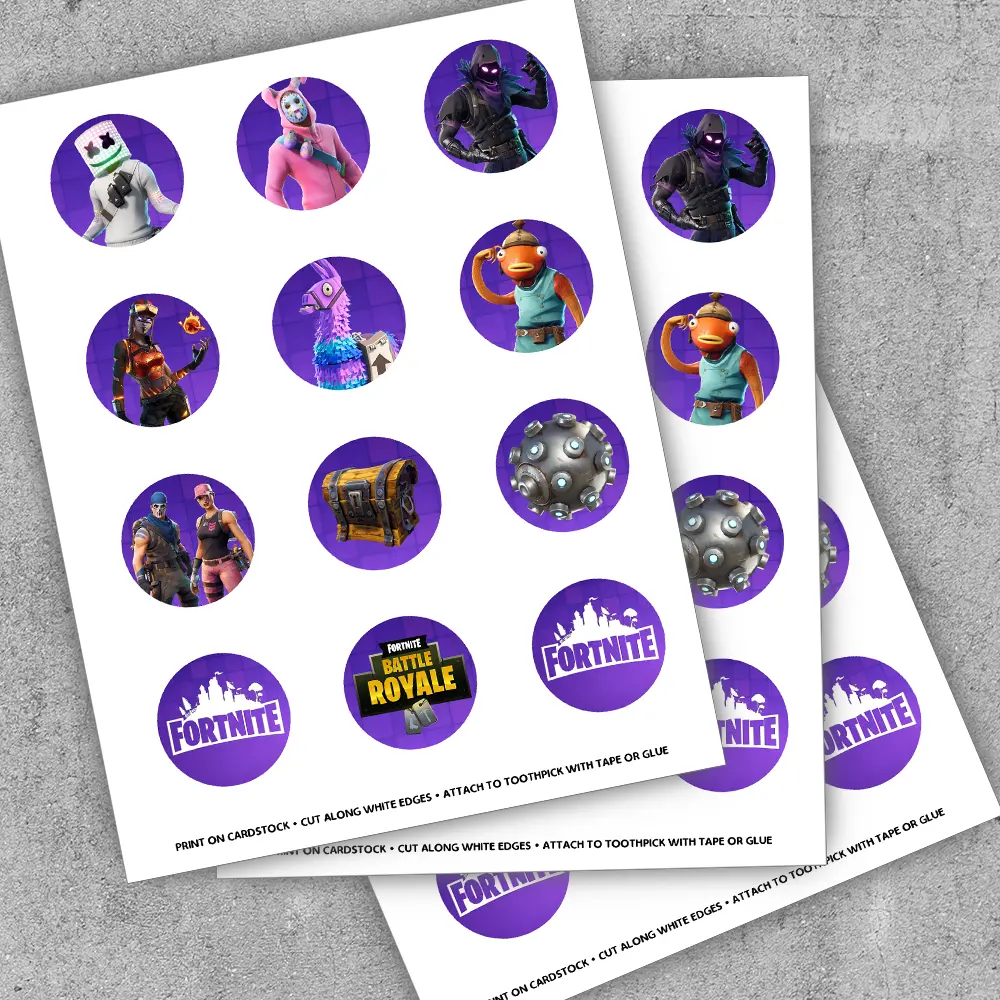 Close-up of 2-inch Fortnite-style toppers with controller buttons and lightning bolts